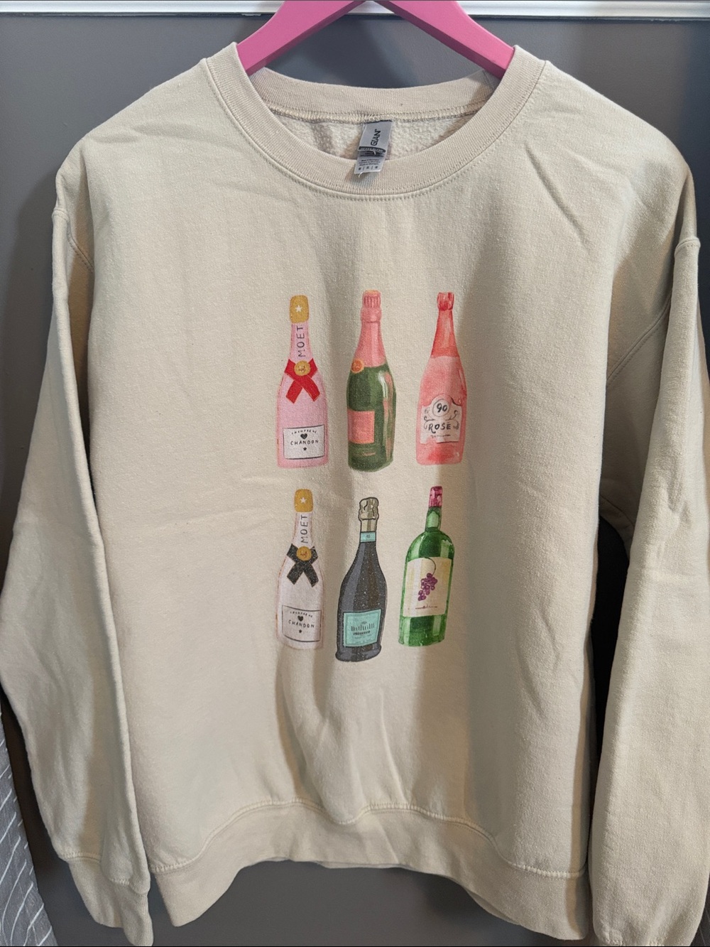 Golden Cream Sweatshirt with Bottles Graphic